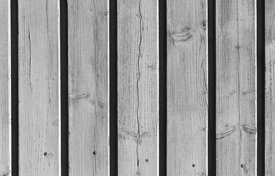 Gray rural wooden wall, black and white background texture
