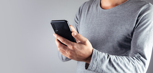 Young man holding a phone