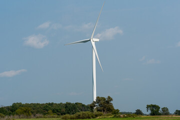 Fototapeta na wymiar Wind Turbines Providing Power In Rural Area