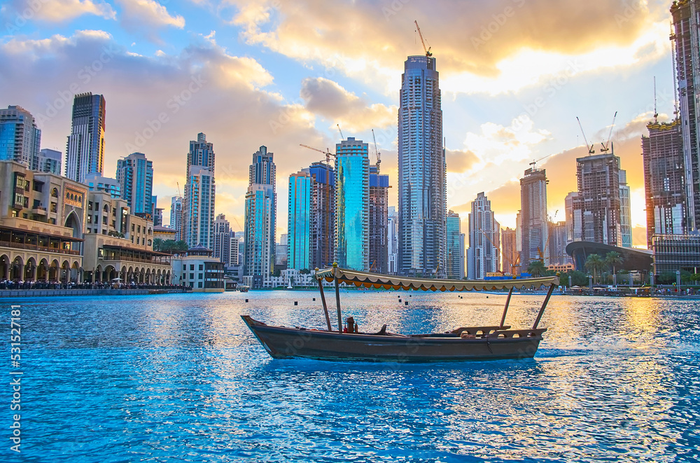 Wall mural The tourist boat on Burj Khalifa Lake, Dubai, UAE