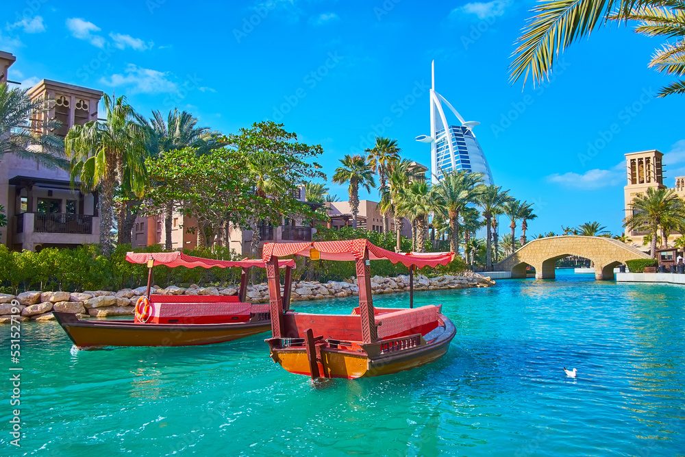 Poster The pleasure boats on canal in Souk Madinat Jumeirah, Dubai, UAE