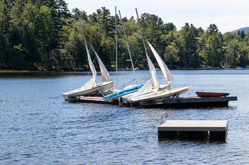 small sailboats on a lake