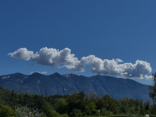 Obraz premium Monte Baldo with clouds, Lake Garda, Vesio, Italy