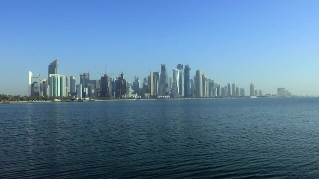 Panorama to the Doha Business District with Tall Cityscrapers with the view to the Gulf water, Qatar