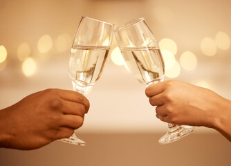 Champagne, toast and hands, a celebration with couple on romantic date drinking with bokeh. Love, romance and luxury, a man and woman cheers to hope of future relationship goal with glass and bubbles