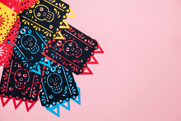 mexico day of the dead paper decorations, background with paper flags, skulls