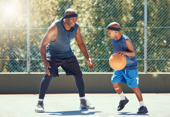 Sport, family and learning basketball with a dad and son training on a court outside for leisure...