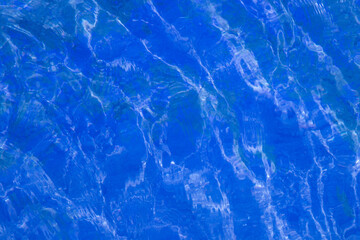 blue water surface. ripples