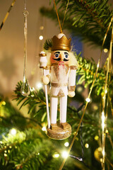 nutcracker as christmas decoration on a tree