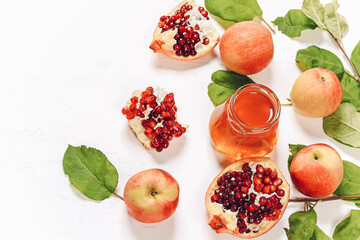 Pomegranate apples and honey. Autumn composition. Traditional Jewish holiday New Year. Happy Rosh Hashanah.