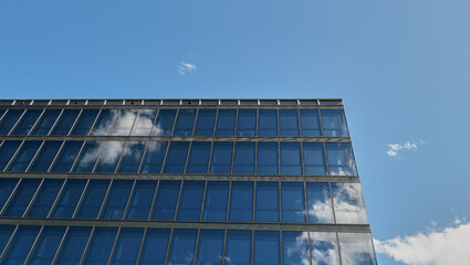 modern glas building in sky
