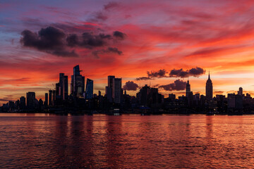 Fototapeta na wymiar New York City Skyline at Sunrise, Colorful Clouds and City Skyline