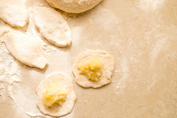 Hand knead dough on cutting board for homemade bakery