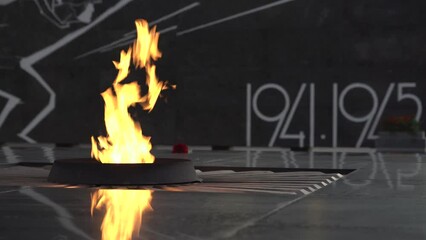 Memorial - Eternal flame lit in honor of the memory of fallen soldiers in world war II