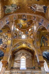 Fototapeta na wymiar Palermo, Italy - July 7, 2020: Famous Martorana cathedral with beautiful mosaics on 12th century walls. Palermo is an UNESCO World Heritage Site with Arab-Norman churches in Sicily, Italy