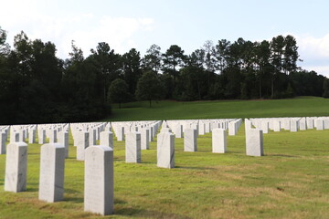 National Cemetery, with markers, head stones , and flags