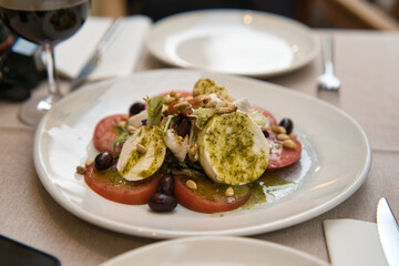 Mediterranean salad with goat cheese and tomato