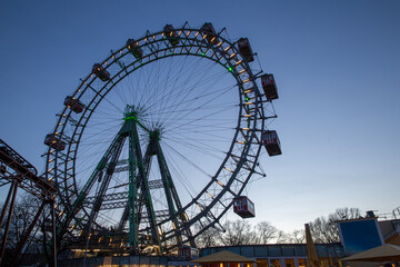 Ferris wheel leaks at the end of a day