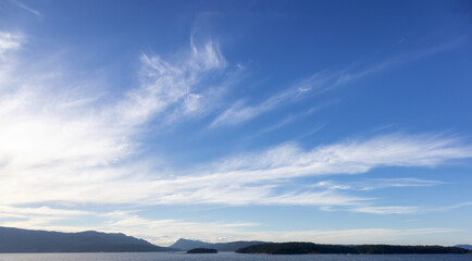 Cloudy Cloudscape during sunny summer Day on the West Coast of Pacific Ocean.