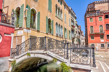 Venice, Italy - July 5, 2022: Building exteriors along the canals in Venice Italy
