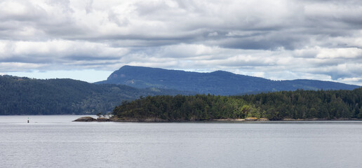 Canadian Landscape by the ocean and mountains. Summer Season.