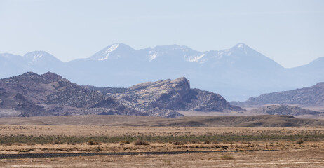 Fototapeta premium Red Rock Formations in the American Landscape Desert at Sunrise.