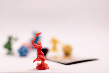 Role play game dices and figures of a warrior fighting