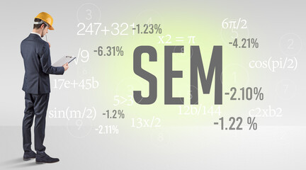 Engineer in hard hat with abbreviation