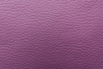 Texture of violet leather as background, closeup
