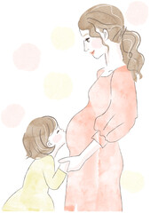 妊婦さんのお腹にキスする女の子