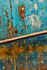 Weathered colourful door surface in Essaouira, Morocco 