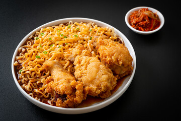 Korean instant noodles with fried chicken or Fried chicken ramyeon