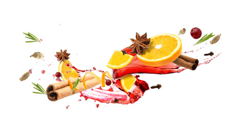 Splash of tasty mulled wine and ingredients on white background