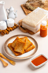 Turnip cake (Chinese : Chai tow kway ). Turnip cake  is a common dish or dim sum of Teochew cuisine in Chaoshan, China usually cut into rectangular slices and sometimes pan-fried before serving.