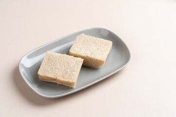 Raw Turnip cake (Chinese : Chai tow kway ). Turnip cake  is a common dish or dim sum of Teochew cuisine in Chaoshan, China usually cut into rectangular slices and sometimes pan-fried before serving.