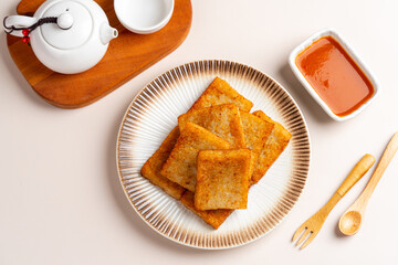 Turnip cake (Chinese : Chai tow kway ). Turnip cake  is a common dish or dim sum of Teochew cuisine...