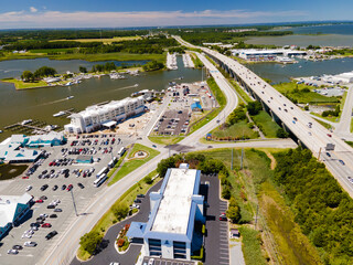 View of the bridge, the bay with the pier, the embankment, the large parking lot for yachts and...