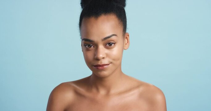 Black woman, beauty and skincare model with health, wellness and skin portrait in studio. Nude cosmetic, smile and happy natural face woman with facial dermatology routine and mock up space.