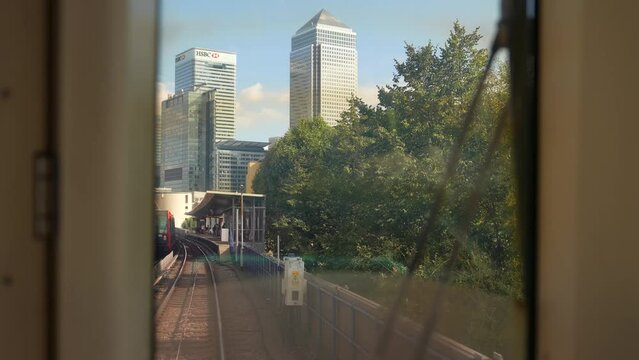 London England September 2022 Rear view from DLR train leaving Canary Wharf