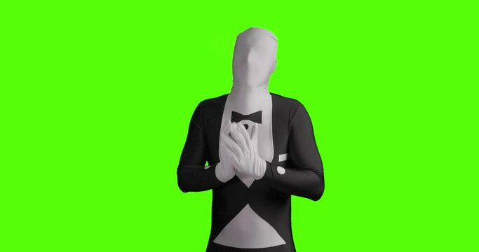 Static shot of a business morphsuit who has a cold and sneezes. Infection with Corona virus or other disease