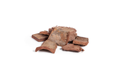 Dry arjun chal or Terminalia arjuna ayurvedic herb on white background