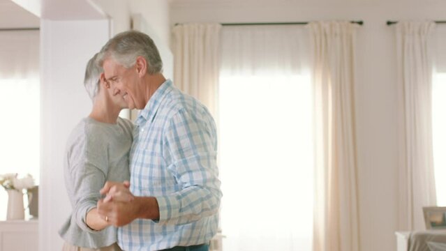 Mature couple, dance and love bond in house living or home interior for fun, playful or celebration. Smile, happy or comic man and senior woman in waltz for marriage anniversary, retirement and trust
