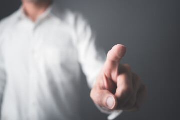 Businessman pointing his finger. Business man hand touching virtual screen, modern background concept with copy space.