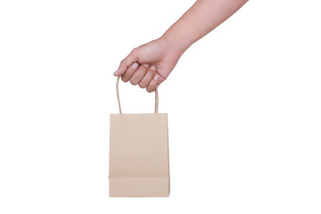 Side View of Hand Holding Paper Bag isolated on White Background. COPY SPACE.