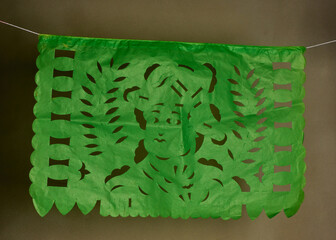 Colorful mexican perforated papel picado banner. Traditional Mexican party decorations.