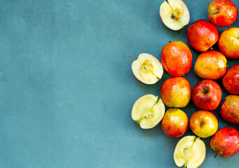 Fresh red apples on a gray background. Fruit. View from above. Free space for text.