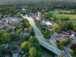 Early evening aerial photo of Schoen Place and the Erie Canal in the Village of Pittsford, New...