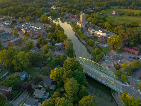 Early evening aerial photo of Schoen Place and the Erie Canal in the Village of Pittsford, New York.
