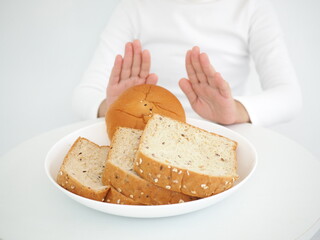 Allergy to wheat flour, children refuse to eat bread. Food concept. Closeup photo, blurred.