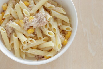 Homemade penne short pasta and tuna with sweet corn salad